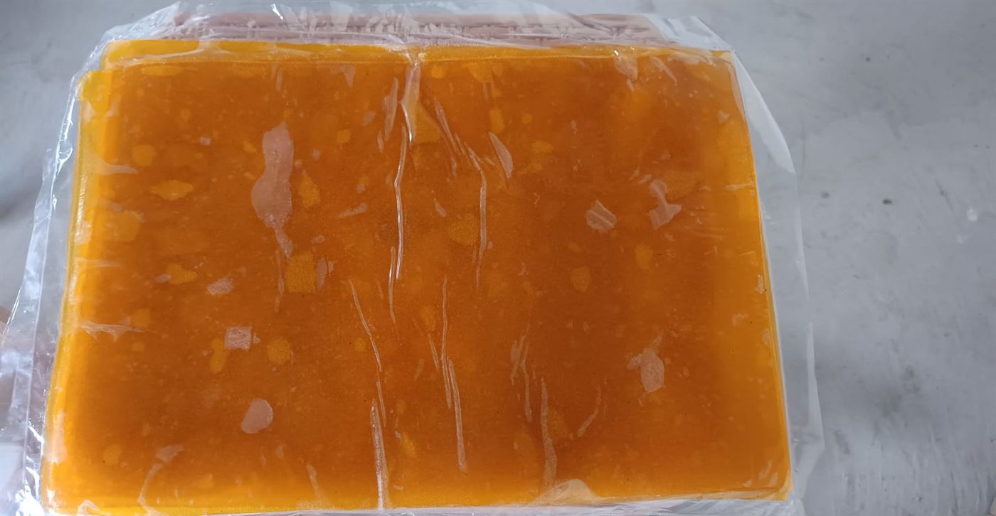 Fresh mango bar sheets, ready to be cut